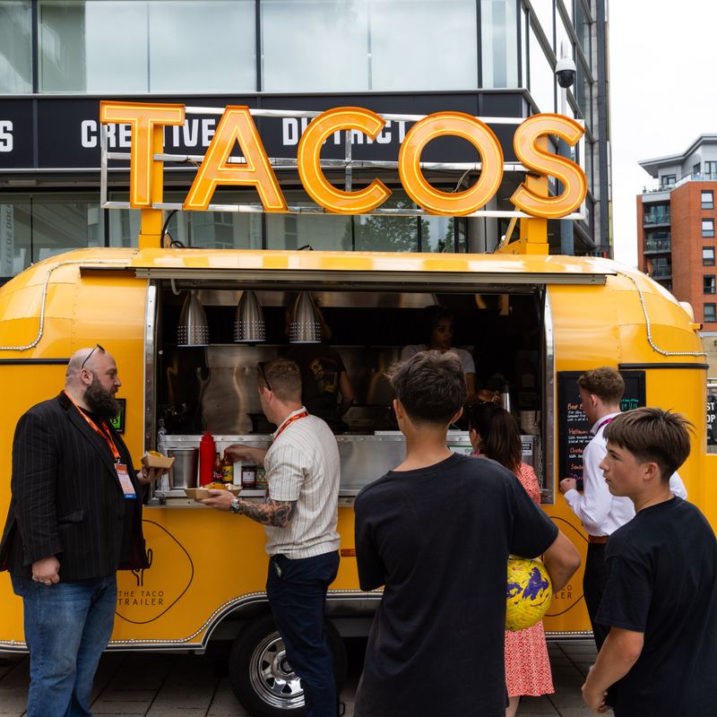The taco truck outside the festival